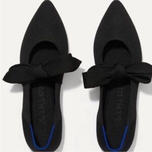 Rothy's Black pointed flat with bow